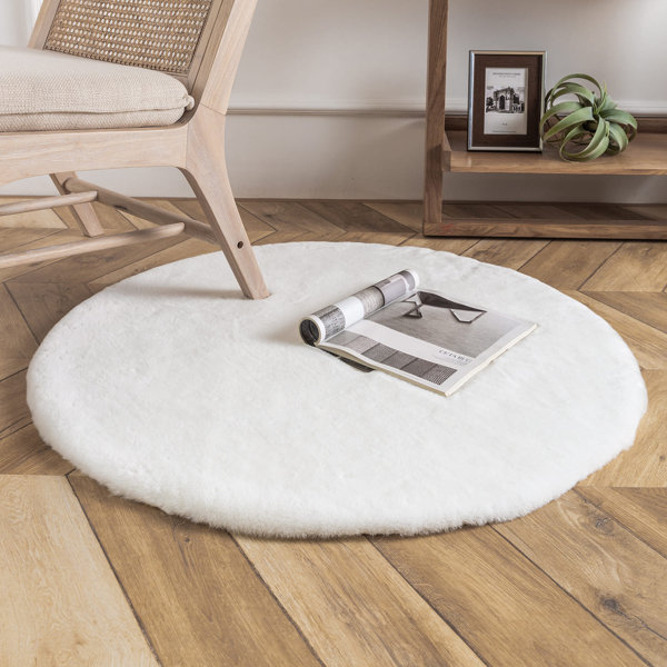 Ebern Designs Camela Machine Woven / Power Loomed Faux Fur White Rug Wayfair